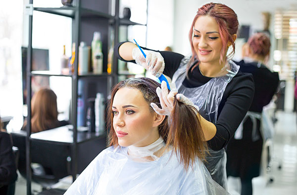 Hair stylist working in a Shops Plus suite